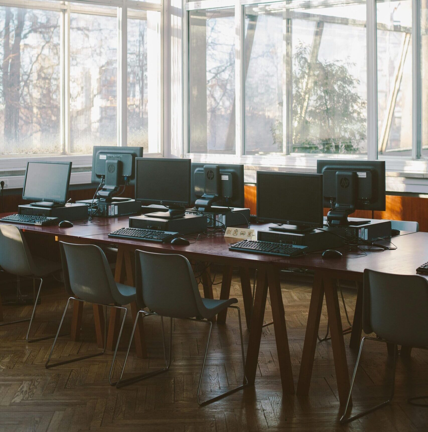 Sunlit computer lab with contemporary design and multiple workstations